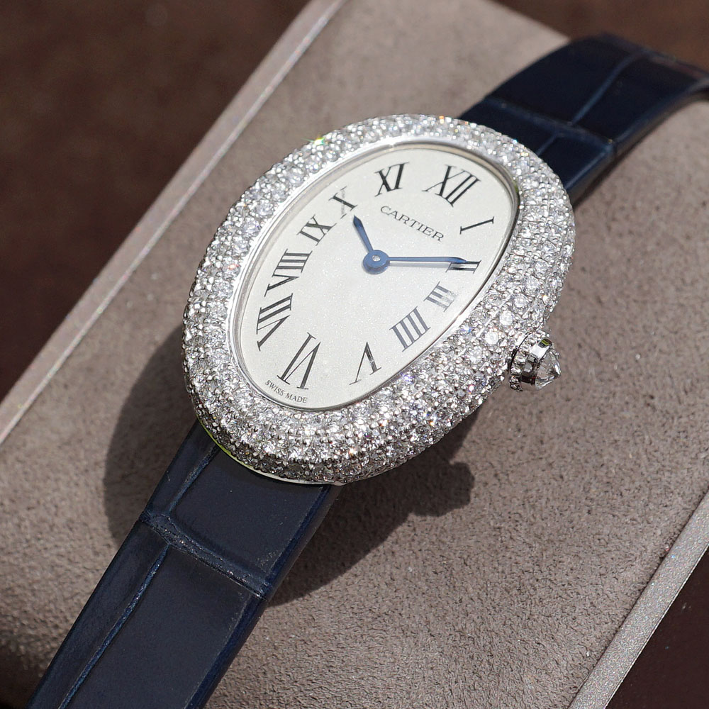 The 18k white gold copy watches are decorated with diamonds.